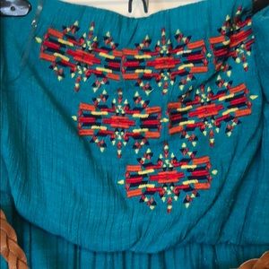 Teal dress with Aztec style stitched pattern